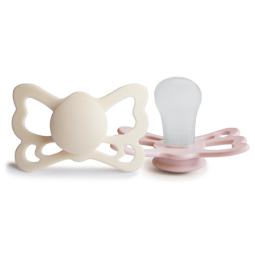 Frigg® Anatomska Duda iz silikona Butterfly Cream/Blush 6-18 M FRIGG