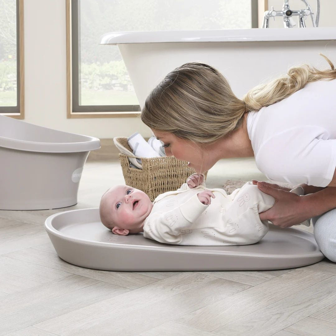 Shnuggle® Previjalna podloga Squishy Taupe Shnuggle