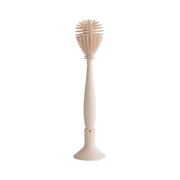 Mushie® Silikonska krtačka za čiščenje Shifting Sand Mushie