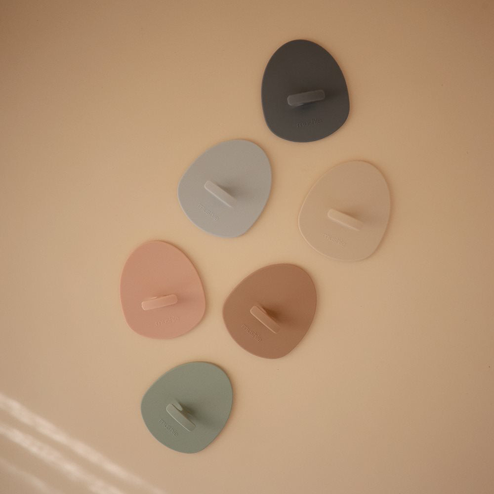 Mushie® Silikonska krtača za odstranjevanje lusk 2 kosa Natural/Cambridge Blue Mushie