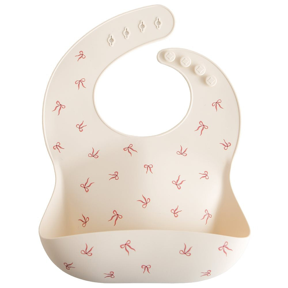 Mushie® Silikonski slinček Bows Mushie