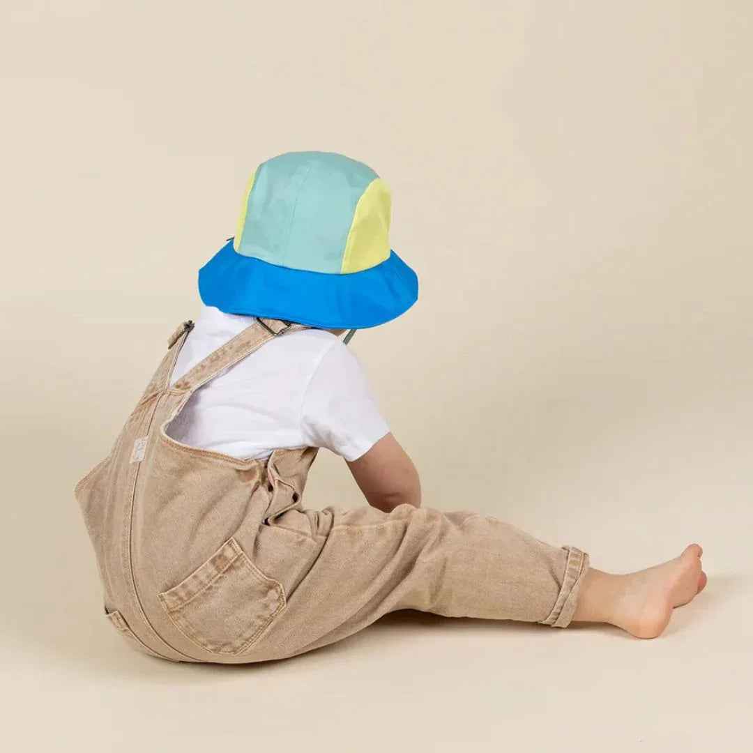 KiETLA® Klobuček Camper Hat Lion Vert Yellow Blue Ki ET LA