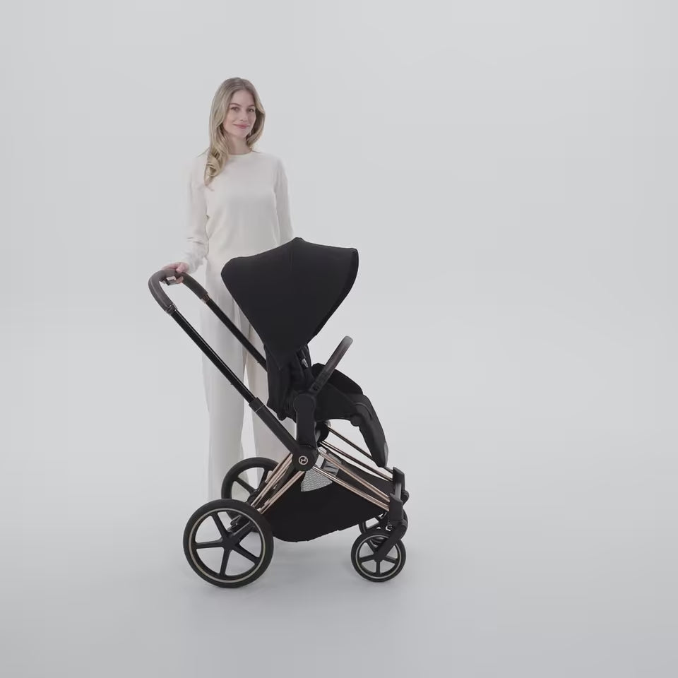 Load video: Cybex Platinum® e-Priam™ 2-in-1 Stroller with Foldable Carry Cot Comfort Sepia Black | Rosegold